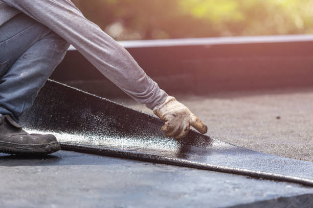 Professional Waterproofing technician working in Chesterville, OH